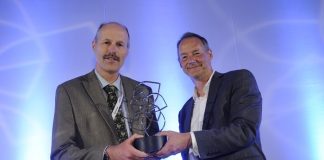 Glenn Swafford (left) receiving his ARMA Award for outstanding contribution to research management and administration from the Leadership Foundation for Higher Education's Paul Gentle