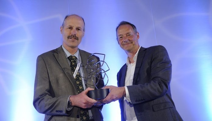 Glenn Swafford (left) receiving his ARMA Award for outstanding contribution to research management and administration from the Leadership Foundation for Higher Education's Paul Gentle