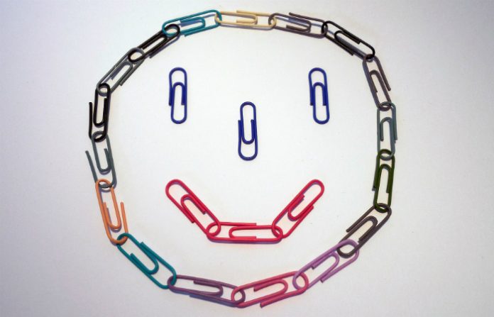 Smiley face made out of paperclips